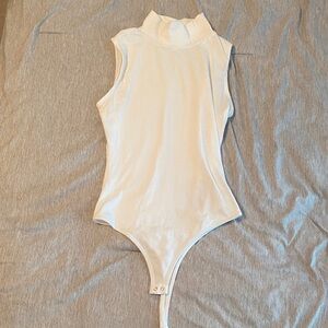 Sleeveless White Bodysuit